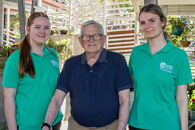 Traineeship students with a resident from one of Wesley Missions Queensland's aged care communities.