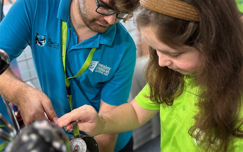 ORCA participants making coffees as they gain real life work experience