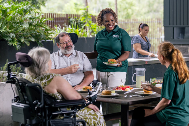 Staff and residents in a disability accommodation in Brisbane