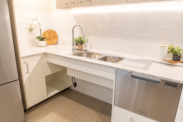 Kitchen sink with no cabinets at disability accomodation in Murarrie, Brisbane