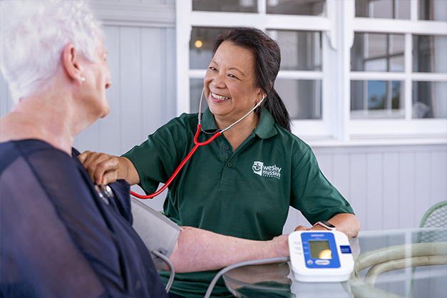 Home Care Brisbane - Checking blood pressure - WMQ