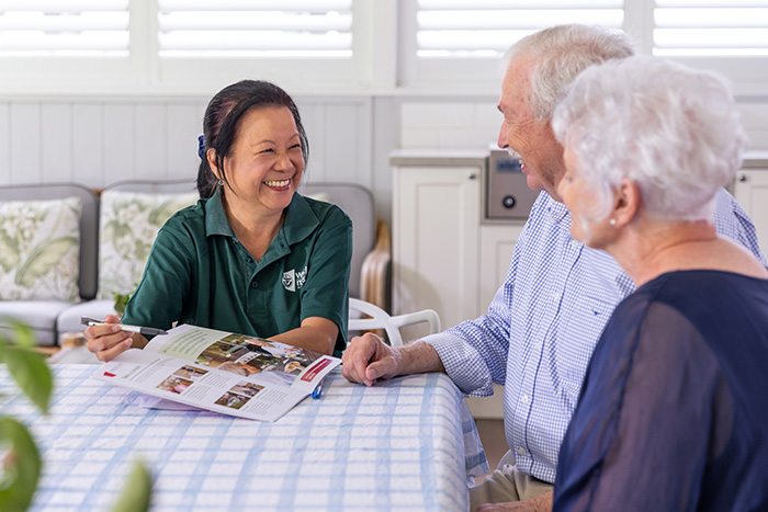 Home Care Brisbane - Staff and couple discussing services and costs