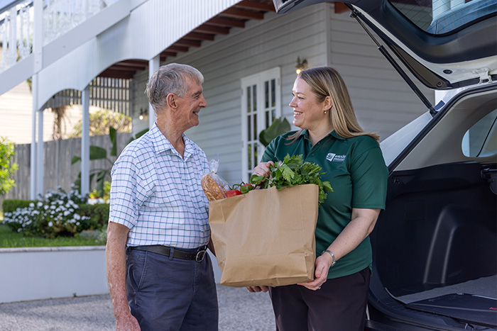 Home Care Brisbane - Staff helping client with groceries