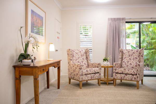 A peaceful sitting area with two chairs