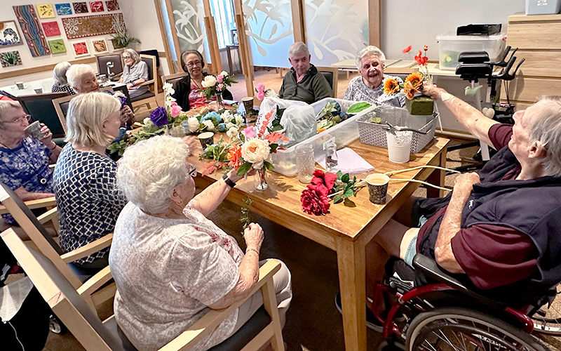 Aged care residents during flowers activity in Dovetree May 2025