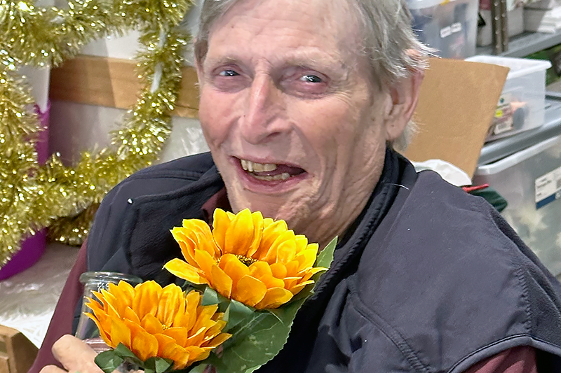 Jock Curtis aged care resident during flowers activity in Dovetree May 2025