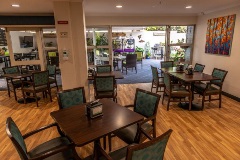 Dining tables and chairs for residents to enjoy their meals together