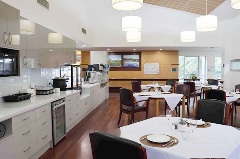 Kitchen room with dining tables at Parkview Residential Aged Care Community in Brisbane North