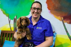 Aged care worker holding an Eden companion