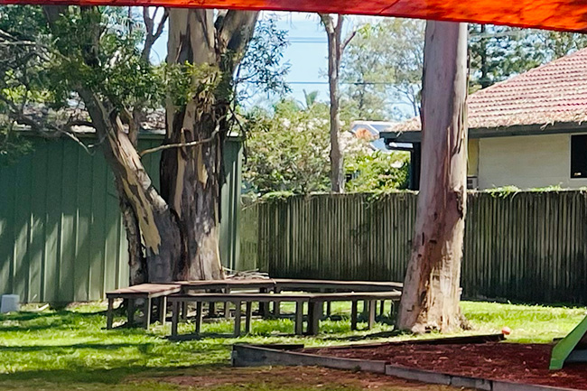 Yarning circle at Eagleby Neighbourhood Centre (outdoor seats in a circle on grass)