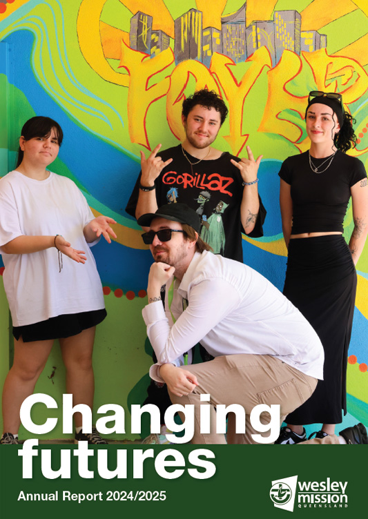 Cover of annual report shows Logan Youth Foyer participants