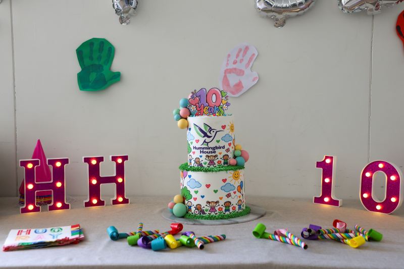 Two-tier cake to celebrate the 10-year anniversary of Hummingbird House
